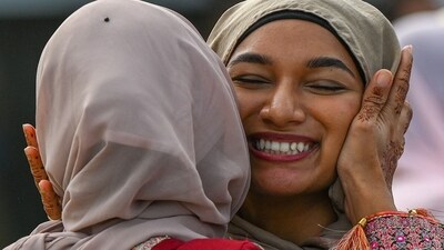 Devotees were seen exchanging greetings after offering Eid-ul-Adha namaz in Srinagar, Jammu and Kashmir. (AFP) Devotees were seen exchanging greetings after offering Eid-ul-Adha namaz in Srinagar, Jammu and Kashmir. (AFP)