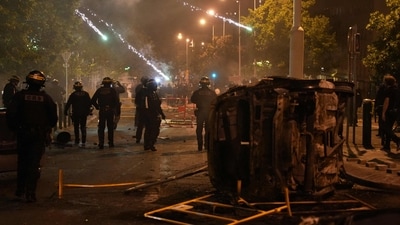 France Protests: Fireworks explode over the heads of French riot police during protests in Nanterre, west of Paris, (AFP) France Protests: Fireworks explode over the heads of French riot police during protests in Nanterre, west of Paris, (AFP)