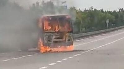 The bus was going from Noida towards Jewar and caught fire on the expressway near the 24km-milestone (Twitter/ImHari49456150) The bus was going from Noida towards Jewar and caught fire on the expressway near the 24km-milestone (Twitter/ImHari49456150)
