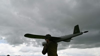 A Ukrainian serviceman of an air reconnaissance squad of the 45th Brigade prepares to launch a Leleka reconnaissance UAV. (AFP) A Ukrainian serviceman of an air reconnaissance squad of the 45th Brigade prepares to launch a Leleka reconnaissance UAV. (AFP)