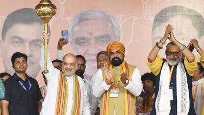 Union home minister Amit Shah with Bihar BJP president Samrat Choudhary and others at a BJP rally at Lakhisarai in Bihar on Thursday. (HT)