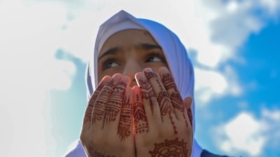 A Muslim devotee offers Eid al-Adha prayers on Thursday. (AFP) A Muslim devotee offers Eid al-Adha prayers on Thursday. (AFP)