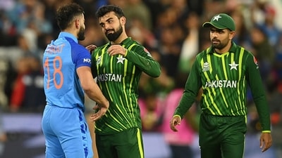 Shadab Khan congratulates Virat Kohli after India defeated Pakistan at last year's T20 World Cup. (Getty)
