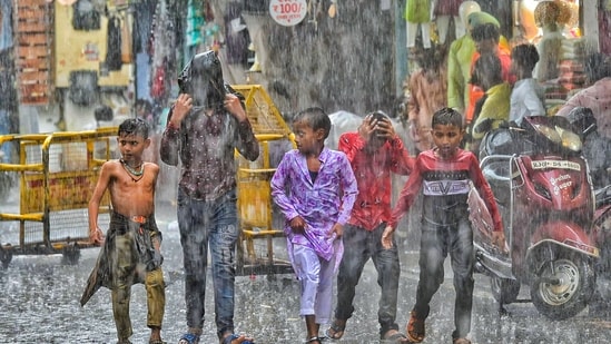 Children during Monsoon rainfall in Ajmer, Thursday, June 29, 2023. (PTI) Children during Monsoon rainfall in Ajmer, Thursday, June 29, 2023. (PTI)
