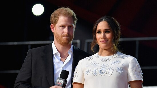 Britain's Prince Harry and Meghan Markle speak during the 2021 Global Citizen Live festival at the Great Lawn, Central Park. (AFP)