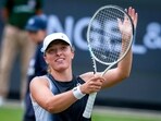 Poland's Iga Swiatek celebrates after beating Russia's Anna Blinkova