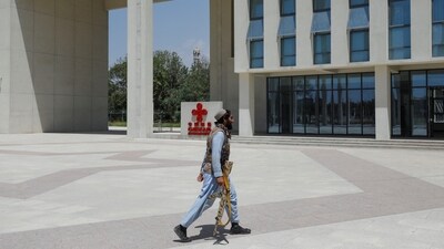 A Taliban soldier walks in Kabul, Afghanistan. (Reuters)