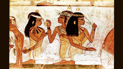 An Egyptian painting from 1400 BCE depicts women holding flowers, an indication that they wore perfume. A new research project is recreating a perfume for this era, one likely worn by Cleopatra. Surprisingly, stronger fragrances such as cinnamon were considered ideal for women, in this period. (Getty Images) An Egyptian painting from 1400 BCE depicts women holding flowers, an indication that they wore perfume. A new research project is recreating a perfume for this era, one likely worn by Cleopatra. Surprisingly, stronger fragrances such as cinnamon were considered ideal for women, in this period. (Getty Images)