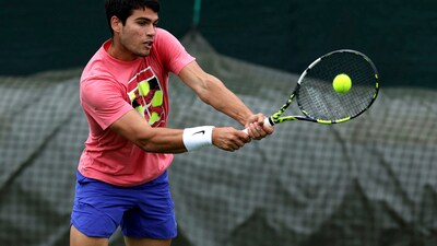 Spain's Carlos Alcaraz practices at the All England Lawn Tennis and Croquet Club in Wimbledon, Friday June 30, 2023, ahead of the championships (AP) Spain's Carlos Alcaraz practices at the All England Lawn Tennis and Croquet Club in Wimbledon, Friday June 30, 2023, ahead of the championships (AP)