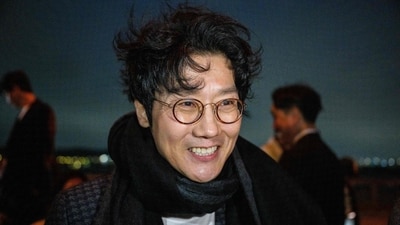 Netflix series Squid Game creator and director Hwang Dong-hyuk attends the Louis Vuitton Pre-Fall 2023 fashion show in Seoul on April 29, 2023. (Photo by ANTHONY WALLACE / AFP) (AFP) Netflix series Squid Game creator and director Hwang Dong-hyuk attends the Louis Vuitton Pre-Fall 2023 fashion show in Seoul on April 29, 2023. (Photo by ANTHONY WALLACE / AFP) (AFP)