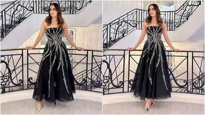 In this photoshoot from Cannes, Manushi stuns in a strapless midi ensemble featuring shimmering metallic embellishments, tulle overlay, cinched waist, corseted bodice, and a flowy silhouette. She styled the outfit with heels, striking makeup, and centre-parted open locks. (Instagram) In this photoshoot from Cannes, Manushi stuns in a strapless midi ensemble featuring shimmering metallic embellishments, tulle overlay, cinched waist, corseted bodice, and a flowy silhouette. She styled the outfit with heels, striking makeup, and centre-parted open locks. (Instagram)