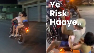 The image shows a couple falling down during a bike stunt. (Twitter/@DelhiPolice) The image shows a couple falling down during a bike stunt. (Twitter/@DelhiPolice)