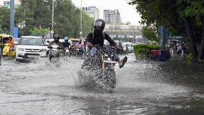 Vehicles ply through a waterlogged road at ITO after rain in New Delhi on Friday. (Sanjeev Verma/HT PHOTO) Vehicles ply through a waterlogged road at ITO after rain in New Delhi on Friday. (Sanjeev Verma/HT PHOTO)