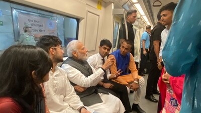 Intially when he boarded the metro amid tight security, the compartment was empty as seen in a video shared by the BJP. However, later PM himself shared photos of his interaction with youngsters. Intially when he boarded the metro amid tight security, the compartment was empty as seen in a video shared by the BJP. However, later PM himself shared photos of his interaction with youngsters.