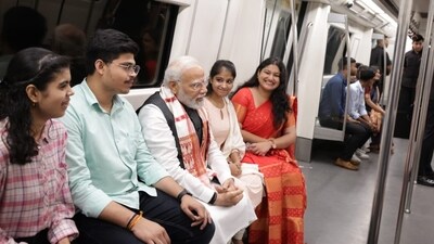 During his speech at the event, PM Modi also shared his metro experience and remarked about the small conversations and interactions that take place during such journeys. During his speech at the event, PM Modi also shared his metro experience and remarked about the small conversations and interactions that take place during such journeys.