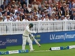 Australia's Nathan Lyon enters the field 