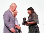 Filmmaker Kartiki Gonsalves accepts the Tara Award from King Charles III and Queen Camilla in London, UK. Filmmaker Kartiki Gonsalves accepts the Tara Award from King Charles III and Queen Camilla in London, UK.