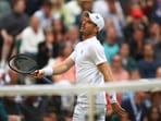 Andy Murray reacts during his second round match against John Isner of the U.S. in Wimbledon 2022