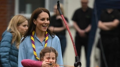 Britain's Catherine, Princess of Wales watches as Britain's Princess Charlotte of Wales tries her hand at archery. (AFP) Britain's Catherine, Princess of Wales watches as Britain's Princess Charlotte of Wales tries her hand at archery. (AFP)