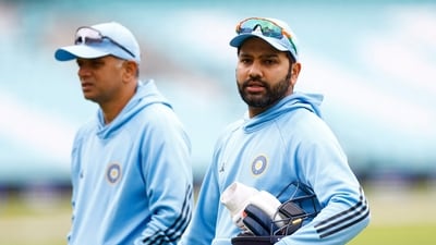 India's Rohit Sharma (R) with head coach Rahul Dravid during practice (Action Images via Reuters)