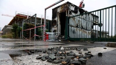 A burnt bungalow at the entrance of a parking following a fourth consecutive night of rioting in France sparked by the death of teenage driver Nahel by a police bullet, in the Aubiers district of Bordeaux, south-western France. (AFP)