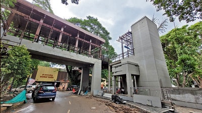 Metro work underway at Balagandharv Rang Mandir premise. Due to this, pipes and other construction debris are scattered in the area inconveniencing citizens. (Pratham Gokhale/HT Photo)