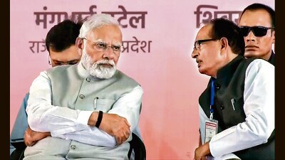 PM Modi with MP CM Shivraj Singh Chouhan on Saturday. (ANI) PM Modi with MP CM Shivraj Singh Chouhan on Saturday. (ANI)