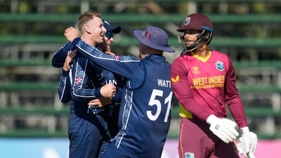 Scotland players celebrate a wicket, during the CC Men's Cricket World Cup Qualifier match between the West Indies and Scotland, at Harare Sports Club, in Harare, Zimbabwe, Saturday, July 1, 2023. (AP Photo/Tsvangirayi Mukwazhi) (AP) Scotland players celebrate a wicket, during the CC Men's Cricket World Cup Qualifier match between the West Indies and Scotland, at Harare Sports Club, in Harare, Zimbabwe, Saturday, July 1, 2023. (AP Photo/Tsvangirayi Mukwazhi) (AP)