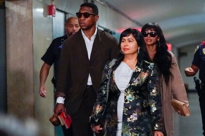 ADDS ATTORNEY PRIYA CHAUDHRY AT CENTER Jonathan Majors, left, and Meagan Good, right, arrive in court for a hearing on his domestic violence case, Tuesday, June 20, 2023, in New York. Attorney Priya Chaudhry appears at center. (AP Photo/Mary Altaffer) (AP)