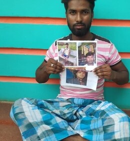 Md Karim showing photo of his brother in law Anjar ul Haque. Md Karim showing photo of his brother in law Anjar ul Haque.