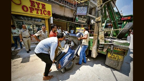 Overage vehicles being confiscated during a drive. (HT Archive)