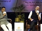 Anupam Kher and Nitin Gadkari at an event.