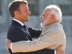 French President Emmanuel Macron welcomes Prime Minister Narendra Modi before a meeting at the Chateau of Chantilly, near Paris, France in August 2019