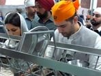 Parineeti Chopra and Raghav Chadha during seva at Golden Temple. (Photo: Viral Bhayani) Parineeti Chopra and Raghav Chadha during seva at Golden Temple. (Photo: Viral Bhayani)