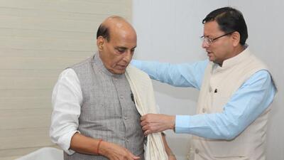 Chief minister Pushkar Singh Dhami greets Union defence minister Rajnath Singh in New Delhi (HT Photo) Chief minister Pushkar Singh Dhami greets Union defence minister Rajnath Singh in New Delhi (HT Photo)