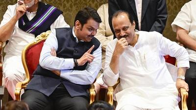 Mumbai, India - July 2, 2023: NCP Leader Ajit Pawar interacts with Dy CM Devendra Fadnavis, while oath taking ceremony at Raj Bhavan in Mumbai, India, on Sunday, July 2, 2023. (Photo by Anshuman Poyrekar/ Hindustan Times) (Hindustan Times) Mumbai, India - July 2, 2023: NCP Leader Ajit Pawar interacts with Dy CM Devendra Fadnavis, while oath taking ceremony at Raj Bhavan in Mumbai, India, on Sunday, July 2, 2023. (Photo by Anshuman Poyrekar/ Hindustan Times) (Hindustan Times)