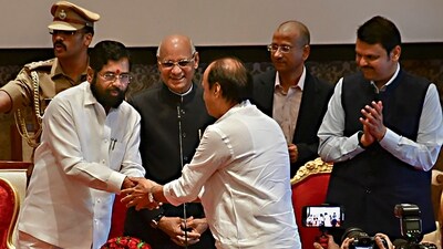 Chief minister Eknath Shinde congratulates the newly sworn-in deputy CM Ajit Pawar at Raj Bhavan. Maharashtra Governor Ramesh Bais and Deputy Chief Minister Devendra Fadnavis are also seen in the picture. (PTI) Chief minister Eknath Shinde congratulates the newly sworn-in deputy CM Ajit Pawar at Raj Bhavan. Maharashtra Governor Ramesh Bais and Deputy Chief Minister Devendra Fadnavis are also seen in the picture. (PTI)