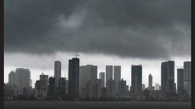 The city skyline is pictured against the backdrop of rain clouds in Mumbai. (AFP) The city skyline is pictured against the backdrop of rain clouds in Mumbai. (AFP)