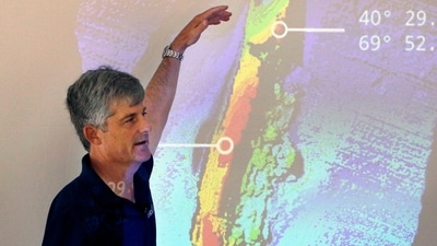 Stockton Rush speaks in front of a projected image of the wreckage of the ocean liner SS Andrea Doria during a presentation on their findings after an undersea exploration (AP Photo/Bill Sikes, File) (AP) Stockton Rush speaks in front of a projected image of the wreckage of the ocean liner SS Andrea Doria during a presentation on their findings after an undersea exploration (AP Photo/Bill Sikes, File) (AP)