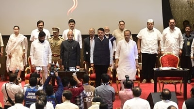 Newly appointed ministers during the national anthem after the oath-taking ceremony at Raj Bhavan on Sunday. (HT Photo/Anshuman poyrekar) Newly appointed ministers during the national anthem after the oath-taking ceremony at Raj Bhavan on Sunday. (HT Photo/Anshuman poyrekar)