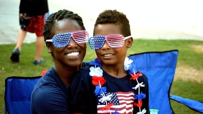 Parades: Many towns and cities across the country host parades on the 4th of July. These parades typically feature marching bands, floats, patriotic displays, and participants dressed in red, white, and blue.&nbsp; (Unsplash)
