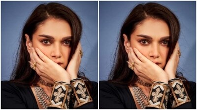 Styled by fashion stylist Sanam Ratansi, Aditi wore her tresses open in wavy curls as she posed for the pictures.&nbsp; (Instagram/@aditiraohydari)