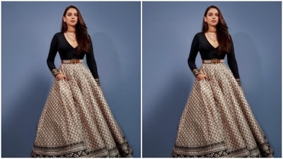 Aditi looked every bit gorgeous in the black gown featuring a plunging neckline, full sleeves with zari details at the borders, further cascading to a long and flowy skirt below the waist in shade of white, black and grey patterns.&nbsp; (Instagram/@aditiraohydari)
