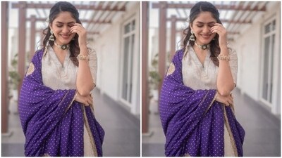 Mrunal decked up in nude eyeshadow, black eyeliner, mascara-laden eyelashes, drawn eyebrows, contoured cheeks, a shade of nude lipstick and a small black bindi.&nbsp; (Instagram/@mrunalthakur)