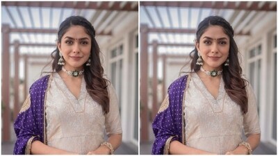 Mrunal wore her tresses open in wavy curls with a part of the hair styled as a mini braid. She posed for the outdoor photoshoot and looked elegant as ever.&nbsp; (Instagram/@mrunalthakur)