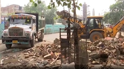 An anti-encroachment drive is being carried out by the PWD in Delhi's Bhajanpura area to remove a Hanuman temple and mazar. (ANI) An anti-encroachment drive is being carried out by the PWD in Delhi's Bhajanpura area to remove a Hanuman temple and mazar. (ANI)