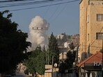 Smoke billows following an Israeli airstrike in the occupied West Bank city of Jenin on July 3, 2023. The Israeli army said it had launched air strikes in the occupied West Bank city of Jenin in an "extensive counterterrorism effort" that the Palestinian health ministry said had killed three residents and injured at least 25 more. (Photo by Jaafar ASHTIYEH / AFP) Smoke billows following an Israeli airstrike in the occupied West Bank city of Jenin on July 3, 2023. The Israeli army said it had launched air strikes in the occupied West Bank city of Jenin in an "extensive counterterrorism effort" that the Palestinian health ministry said had killed three residents and injured at least 25 more. (Photo by Jaafar ASHTIYEH / AFP)