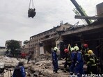 Emergency services work near to a restaurant RIA Pizza destroyed by a Russian attack in Kramatorsk, Ukraine,. (AP)