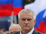 FILE PHOTO: Head of Crimea Sergei Aksyonov attends a ceremony as reservists drafted during partial mobilisation depart for military bases, in Sevastopol, Crimea September 27, 2022. REUTERS/Alexey Pavlishak/File Photo