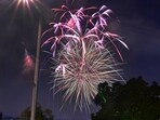 An Independence Day fireworks display is seen during the annual Independence Day holiday celebration at Barnes Park in Monterey Park, California, on July 1, 2023, where 11 people were killed in a Mass Shooting six months ago during Lunar New Year celebrations. Monterey Park is just one of many Southern California cities who celebrate July 4 with fireworks a few days before the actual date, one reason being there are not enough Sheriff's deputies to provide security and work on July 4.
